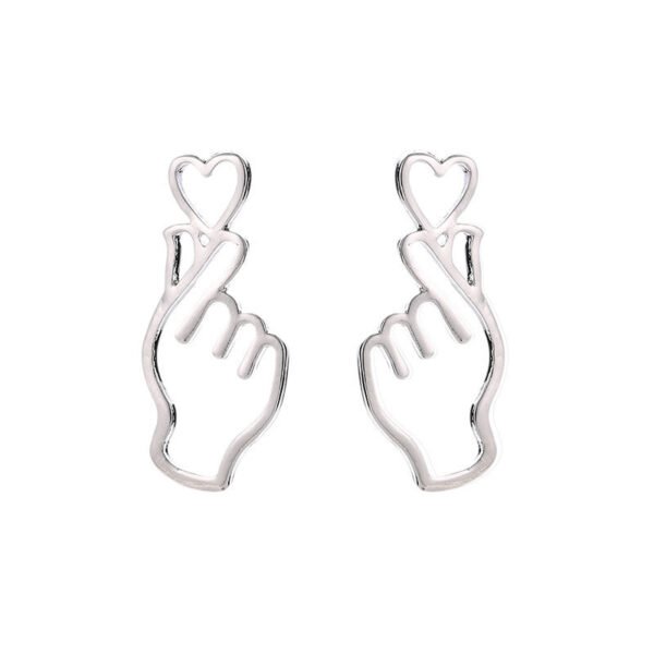 Heart between fingers earrings