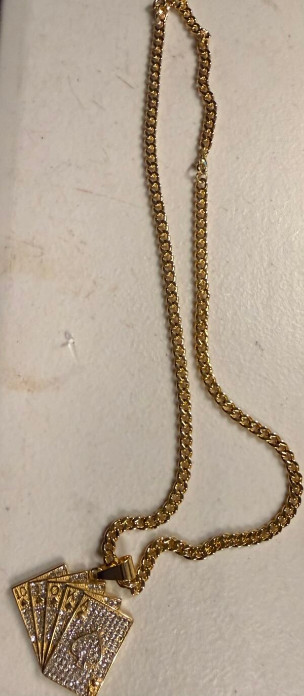 24 INCH GOLD TONE STAINLESS STEELNECKLACE WITH AN ACE HIGH STRAIGHT FLUSH POKER HAND PENDANT