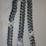 20 inch silver plated stainless steel necklace with 4 station links iced out with cubic zarconia stones