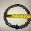 2.5 INCH DIAMETER STRETCH BRACELET ENAMALD STAINLESS STEELWITH A EBONY AND BROWN COLOR