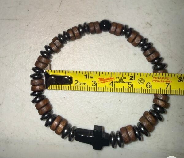 2.5 INCH DIAMETER STRETCH BRACELET ENAMALD STAINLESS STEELWITH A EBONY AND BROWN COLOR