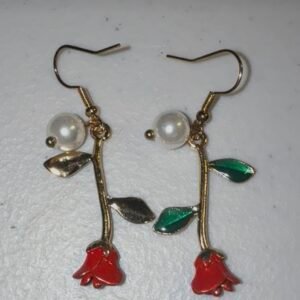 GOLD TONEEARRINGSWITH ENAMALD ROSES ON LONGSTEMEWITH A FAUX PEARL STUD