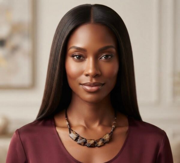 A TRADITIONAL KENYAN TRIBAL COW BONE NECKLACEFEATURING FIVE SEGMENTS SEORATED BY BLACK SEED BEADS